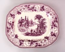 A VICTORIAN PURPLE GLAZED PORCELAIN SERVING DISH WITH ISLAMIC DECORATION, 43CM X 36CM.