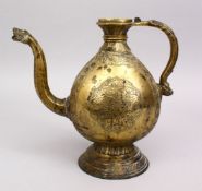 A GOOD 18TH CENTURY INDIAN BRONZE EWER, with carved panels of foliage decoration, and a beast spout,