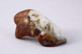 A GOOD CHINESE CARVED JADE ARCHAIC RAM PENDANT, 6cm.