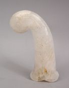 A GOOD INDIAN MUGHAL / ISLAMIC CARVED JADE / CRYSTAL DAGGER HANDLE, with carved formal motif, 13cm.
