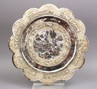 A FINE QUALITY CHINESE SILVER LOBED CIRCULAR FRAME, the frame with open work panels of bamboo,