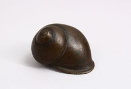 A JAPANESE BRONZE NETSUKE OF A SNAIL SHELL, 4.5cm.