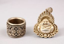 A CHINESE WHITE METAL ARCHERS RING AND PENDANT, the ring 3cm, the buddha pendant 5cm.