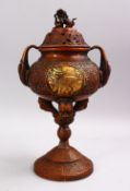 A CHINESE BRONZE AND GILT HIGH FOOT BRONZE CENSER, the censer stood upon a fixed carved stand with