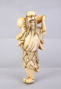 A JAPANESE EDO PERIOD CARVED IVORY NETSUKE OF A SENNIN, stood looking aloft holding a double gourd