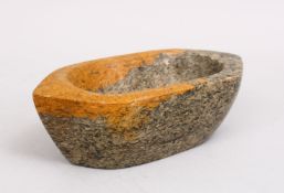 A 17TH / 18TH CENTURY INDIAN DECCANI CARVED FOSSILISED STONE MORTAR, 15cm wide.