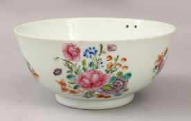 AN 18TH CENTURY CHINESE FAMILLE ROSE PORCELAIN BOWL, decorated with scenes of native flora 14cm
