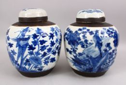 A PAIR OF 19TH CENTURY CHINESE BLUE & WHITE PORCELAIN CRACKLE GLAZED GINGER JARS & COVERS, both with