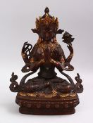 A CHINESE GILT BRONZE FIGURE OF A BUDDHA, In a seated position with highlights of semi precious