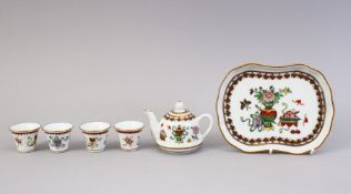 A 20TH CENTURY CHINESE FAMILLE ROSE TEA SET & TRAY, the set comprising four cups, one teapot and one
