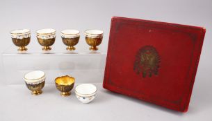 A RARE SET OF 19TH CENTURY TURKISH OTTOMAN WHITE METAL GILT CUPS WITH PORCELAIN LINERS AND ORIGINAL