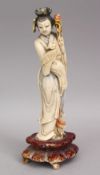 A CHINESE CARVED IVORY POLYCHROMED FIGURE OF GUANYIN, 21cm