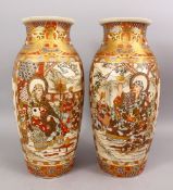 A GOOD PAIR OF JAPANESE MEIJI PERIOD SATSUMA CERAMIC VASES, decorated with two main panels depicting