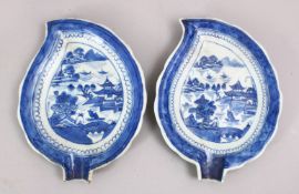 A GOOD PAIR OF 18TH / 19TH CENTURY CHINESE BLUE & WHITE PORCELAIN LEAF SHAPED DISHES, with typical