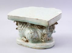 A GOOD 19TH / 20TH CENTURY CHINESE CELADON PORCELAIN PILLOW, depicting beneath the carved pillow