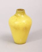 A GOOD 19TH / 20TH CENTURY CHINESE PEKING GLASS SNUFF BOTTLE, the yellow bottle in the baluster