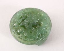 A 20TH CENTURY CHINESE JADEITE CARVED DRAGON BELT BUCKLE, carved to depict a dragon wiht a flaming
