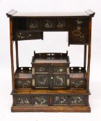 A JAPANESE MEIJI PERIOD MIXED METAL & LACQUER MINATURE SHODANA / CABINET, with varying panels of