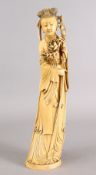 A GOOD 19TH CENTURY CHINESE CARVED IVORY FIGURE OF GUANYIN, stood holding her staff and floral