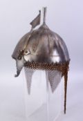 A GOOD INDIAN MUGHAL INLIAD STEEL HELMET, the helmet with silver inlays, chain mail to the verso