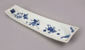 A 19TH CENTURY CHINESE BLUE & WHITE PORCELAIN OBLONG DISH, decorated with precious and buddhistic