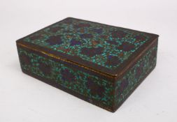 A 19TH CENTURY INDIAN KASHMIRI ENAMELLED COPPER BOX, with decoration of formal scrolling foliage,