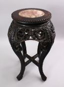 A GOOD 19TH CENTURY CHINESE HARDOOD MARBLE TOP PLANT STAND, the top inset with a marble roundel,