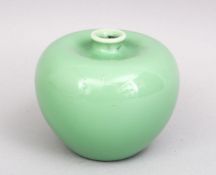 A CHINESE PALE GREEN PORCELAIN BRUSH WASH, 11CM.