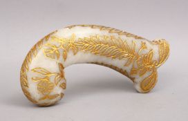 A GOOD INDIAN MUGHAL / ISLAMIC CARVED JADE & GILT DAGGER HANDLE, the handle incised with gilt,