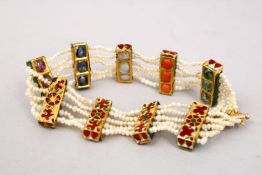 A FINE 19TH CENTURY INDIAN ENAMELLED GEM SET GOLD & PEARL BRACELET,