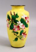 A JAPANESE MEIJI / TAISHO PERIOD CLOISONNE YELLOW GROUND VASE, the yellow gound with silver rim