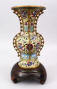 A FINE QUALITY 20TH CENTURY CHINESE CLOISONNE VASE, the vase with a pale yellow ground with formal