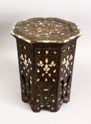A 19TH CENTURY MOORISH CARVED HARDWOOD OCTAGONAL INLAID OCCASIONAL TABLE, inlaid with mother of