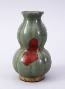 A CHINESE SONG STYLE CELADON & IRON RED CRACKLE GLAZED DOUBLE GOURD POTTERY VASE, with a ribbed