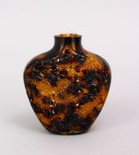 A CHINIESE TURTLE SHELL SNUFF BOTTLE, with openwork carved dragons, 6cm.