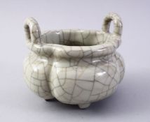A GOOD CHINESE QUATREFOIL CRACKLE GLAZE TWIN HANDLE PORCELAIN CENSER, the base with four moulded