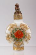 A GOOD CHINESE PEKING GLASS PAINTED SNUFF BOTTLE, with twin roundels of floral decoration, with