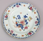 A GOOD 18TH CENTURY CHINESE FAMILLE ROSE PORCELAIN PLATE, decorated with flora and gilding, 23cm.