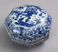 A LARGE CHINESE MING STYLE BLUE & WHITE PORCELAIN FRUIT BOX & COVER, decorated with a main panel