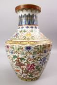 A GOOD CHINESE KANGXI STYLE FAMILLE ROSE PORCELAIN VASE, decorated with scenes of native flora