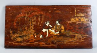 AN INDIAN / PERSIAN CARVED WOODEN AND INLAID PANEL, depicting two figures seated exterior,