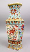 A CHINESE FAMILLE ROSE PORCELAIN VASE, with formal floral decoration upon turquoise ground, with