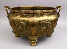 A GOOD CHINESE 19TH CENTURY BRONZE JARDINIERE, the body of the planter with embossed panels of