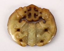 AN UNUSUAL 19TH / 20TH CENTURY CHINESE CARVED JADE PENDANT - COAT OF ARMS STYLE, carved in the