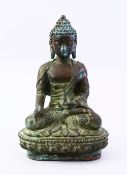 A GOOD EARLLY 17TH / 18TH CENTURY TIBETAN BRONZE FIGURE OF BUDDHA, in a seated position holding a