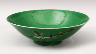 A GOOD CHINESE KANGXI PERIOD GREEN GROUND FAMILLE VERTE PORCELAIN BOWL, decorated with stylized