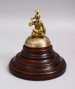 A RARE TURKISH OTTOMAN BRASS CLOCKWORK DESK BELL OF A FIGURE, by brevete Paris, the bell alone