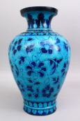 A GOOD 19TH / 20TH CENTURY INDIAN TURQUOISE POTTERY VASE, decorated with floral decoration, 44cm