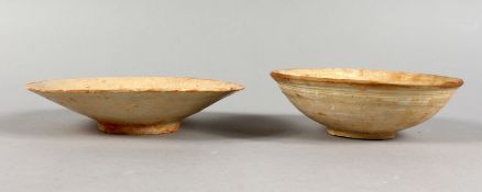 TWO EARLY CHINESE TERRACOTTA BOWLS.