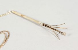 A MAPPIN & WEBB SILVER SWIZZLE STICK on a chain in a Mappin & Webb box.